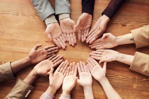 upturned hands all together